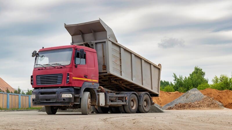 Truck unloading building materials